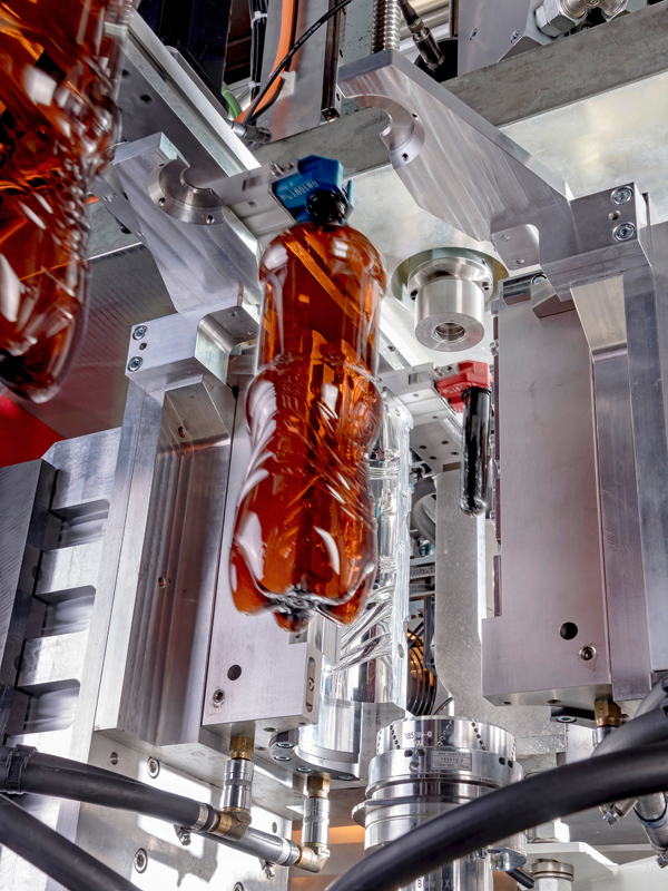 Schultze Anlagentechnik GmbH Erfahrung Musterflasche in Maschine